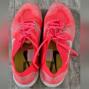 Nike Pink and White Athletic Shoes Modern Sporty Design